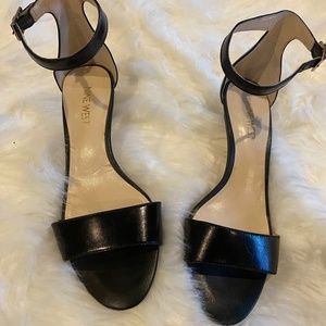 Ladies Nine West black leather heels size 5